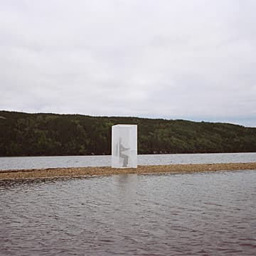 Semi-transparent Thinking Box on Thin Strip of Sand, Newfoundland, 1999