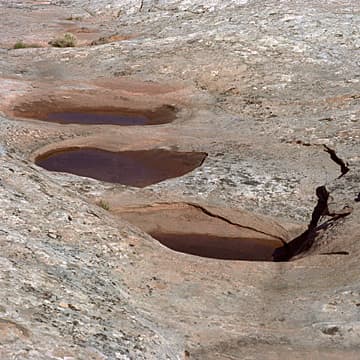 Three holes in the Desert, Utah, 2000