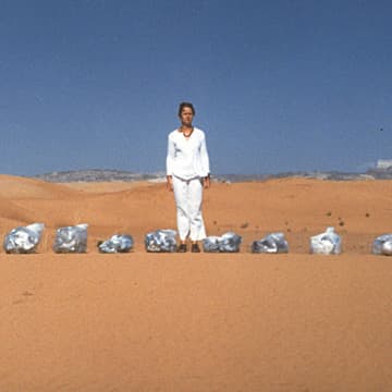 Desert Highway Cleansing / Self-portrait with Twelve Bags of Trash, Utah, 2000